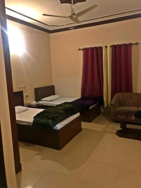Babar House Hotel Faisalabad Luaran gambar